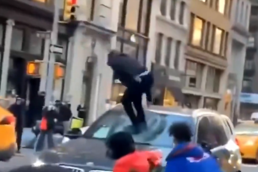 Aggressive Attack: Youth Gang Destroys BMW in Front of Shocked Bystanders